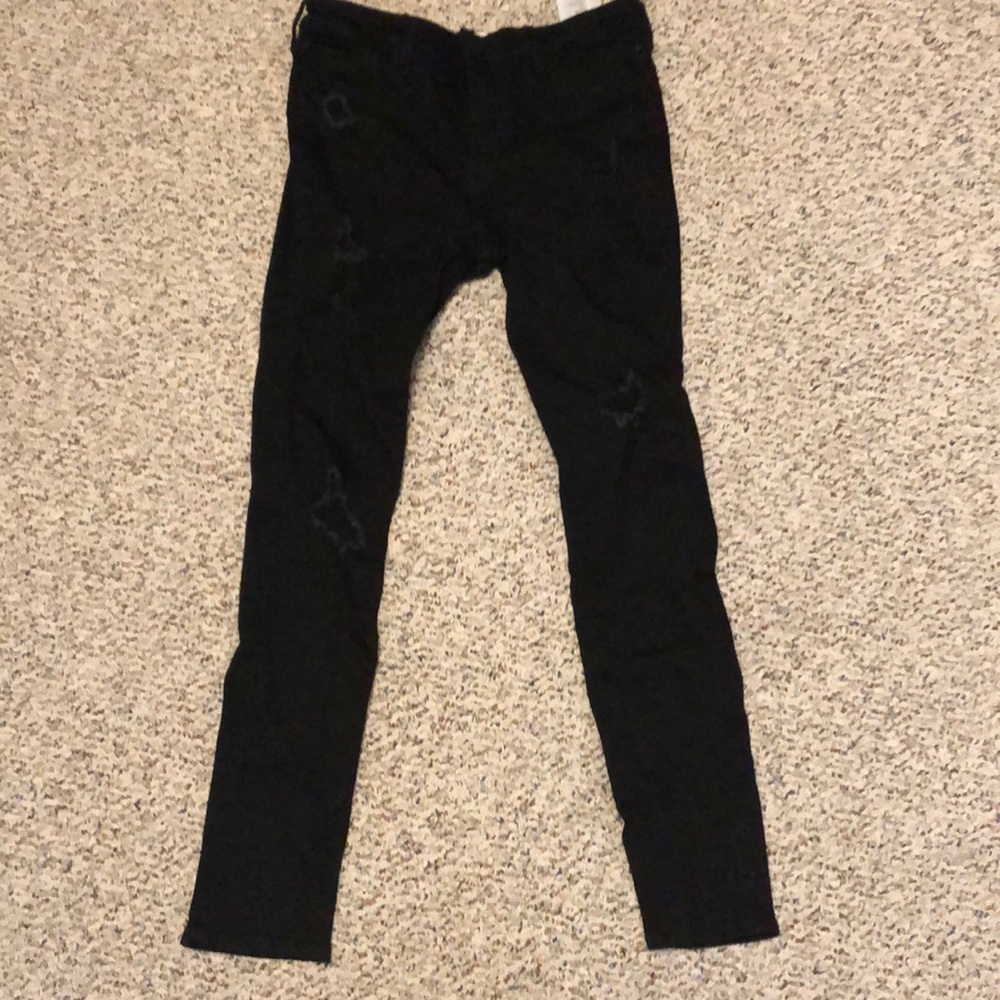black ripped high rise jeans